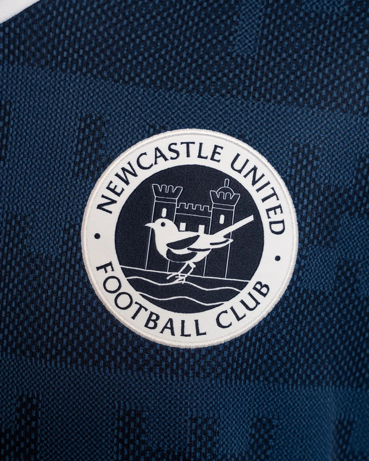 Newcastle United Away Shirt 26/27 – crest detail | FullKit